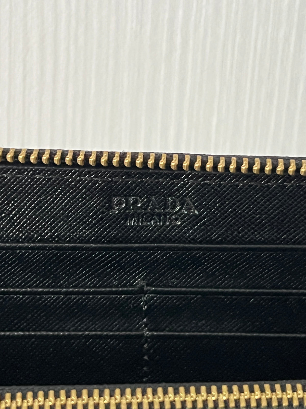 Prada Black Saffiano Leather Zip Around Wallet