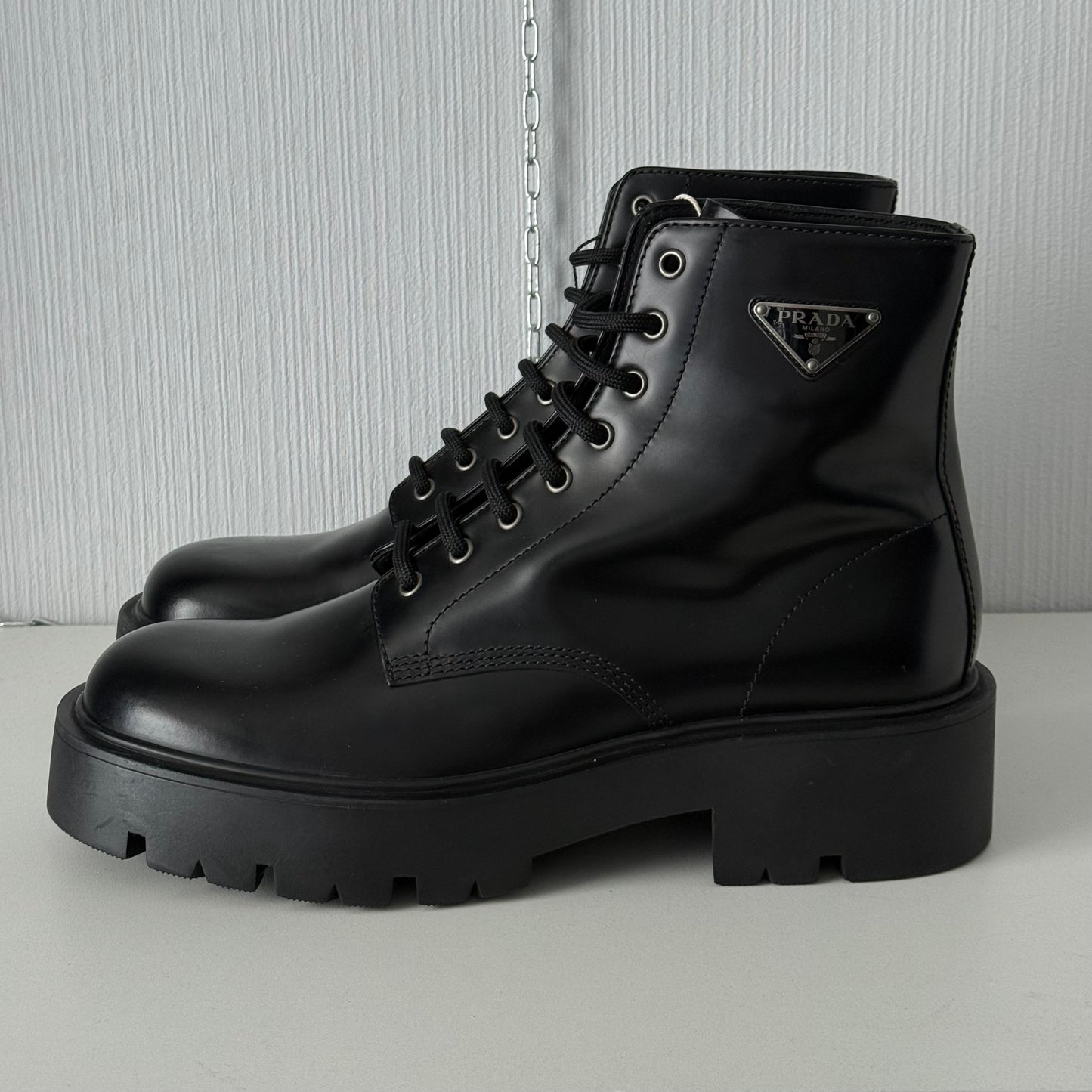Prada Triangle Logo Brushed Leather Ankle Boots