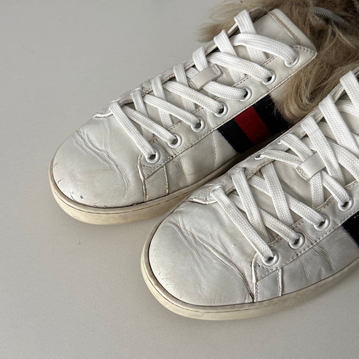 Gucci White Leather Fur Lined Ace Sneakers