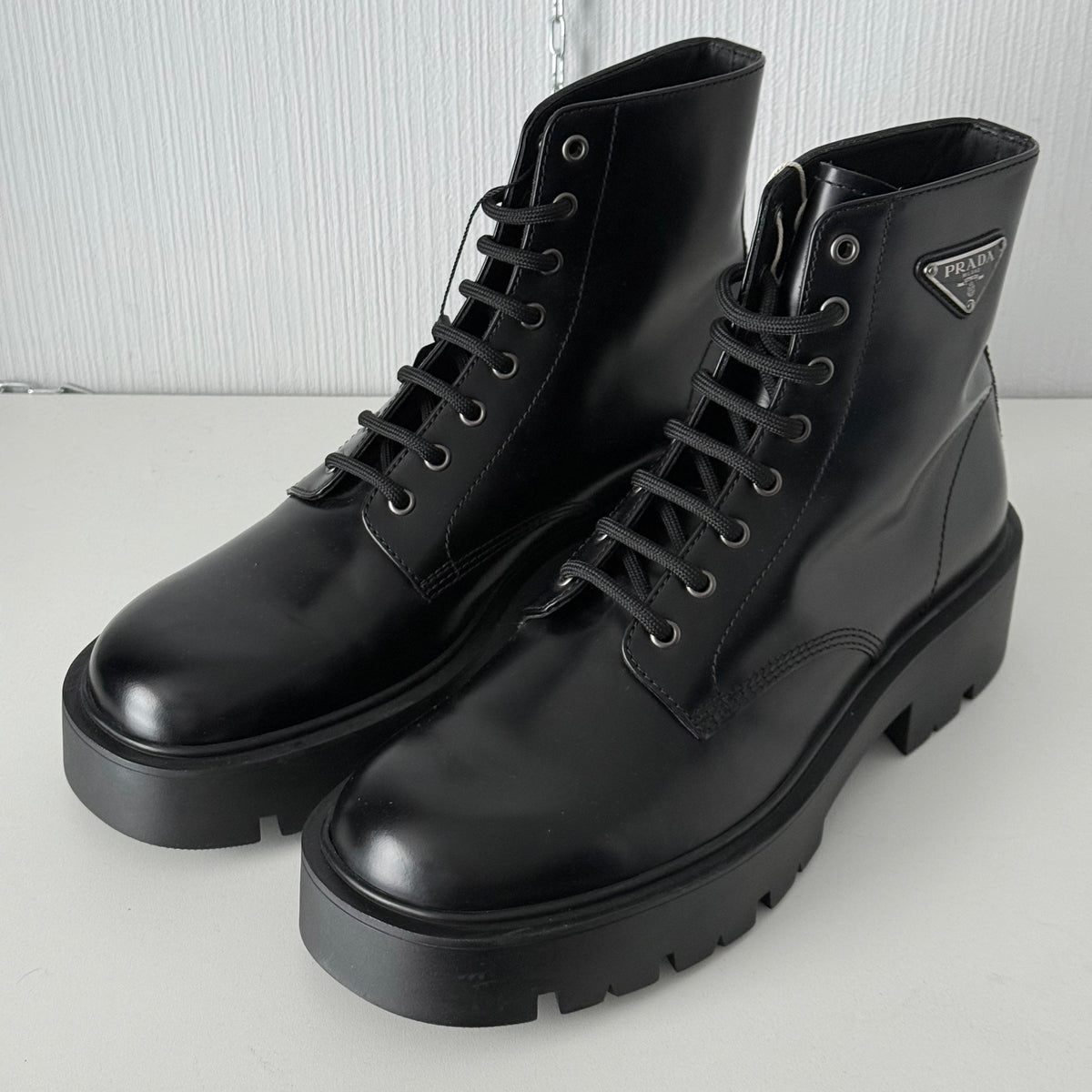 Prada Triangle Logo Brushed Leather Ankle Boots