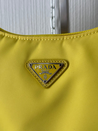 Prada Re-edition 2000 Nylon Shoulder Bag In Yellow