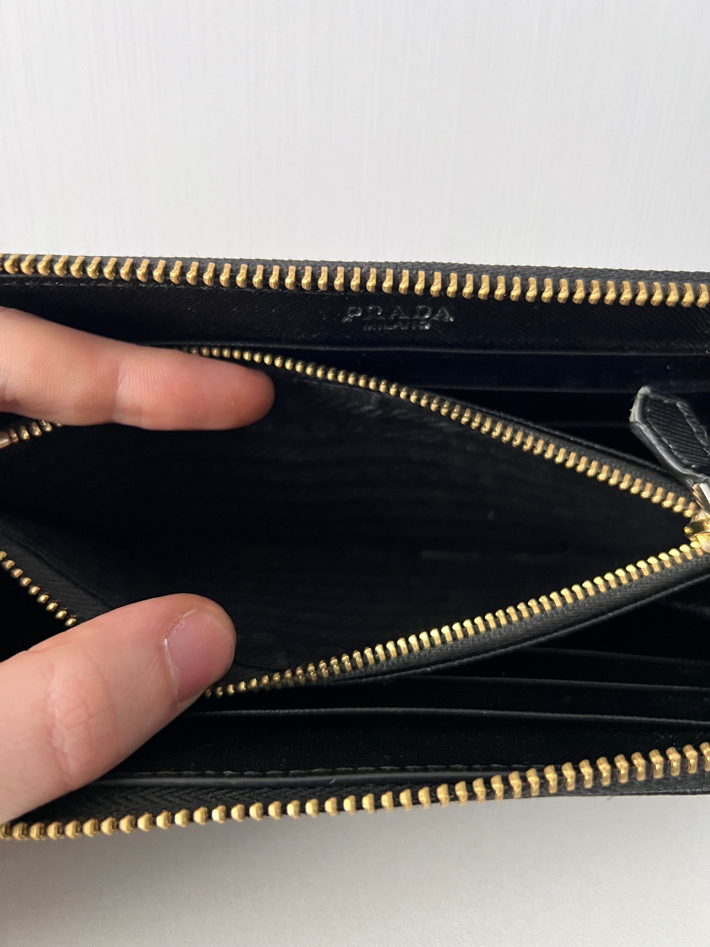 Prada Black Saffiano Leather Zip Around Wallet