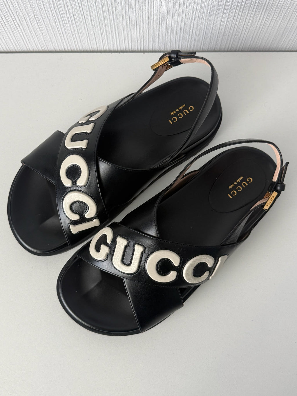 Gucci Black Leather Logo Cross Strap Womens Sandals